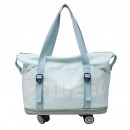 Expandable wheeled travel bag with retractable handle