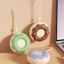 Donut-shaped portable lint remover