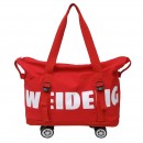 Expandable wheeled travel bag with retractable handle