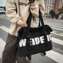 Expandable wheeled travel bag with retractable handle