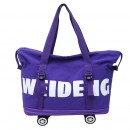 Expandable wheeled travel bag with retractable handle