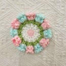 Woven flower cup mat