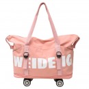 Expandable wheeled travel bag with retractable handle