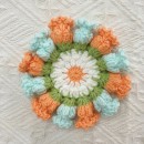 Woven flower cup mat