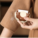 Donut-shaped portable lint remover
