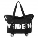 Expandable wheeled travel bag with retractable handle
