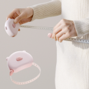 Portable magnetic tape measure