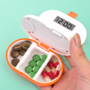 Electronic timed reminder for dividing medication boxes