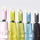 Automatic three-fold umbrella with buckle